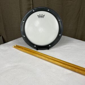 Remo practice pad drum with 2 drumsticks used 9.5” diameter